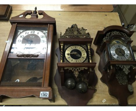 Three continental wall clocks one with a moon roller (3)
