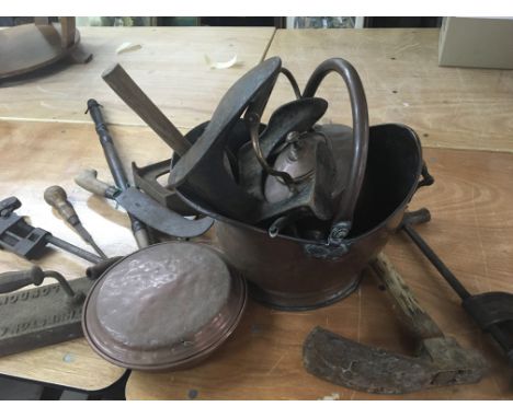 A collection of copper Ware including a kettle coal bucket and vintage tools and old mincers.