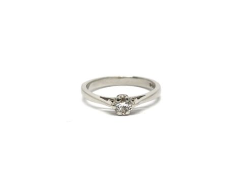 A platinum and solitaire diamond ring, total weight approx 4 grams, ring size L/M.