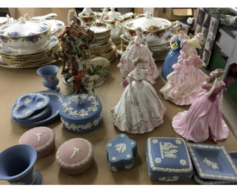 A collection of Wedgwood, Coalport and Worcester ,and two Naples figures