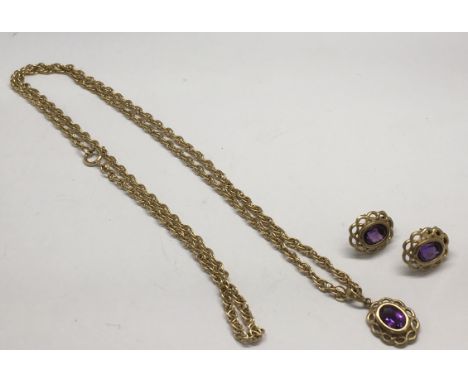 A 9ct gold amethyst pendant and chain with matching earrings