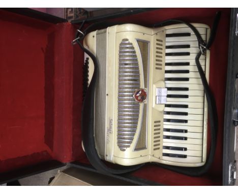 A circa 1950s accordion in a case.