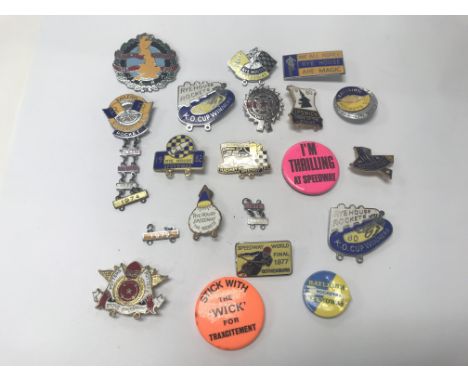 A collection of vintage Rayleigh Rockets Speedway badges.