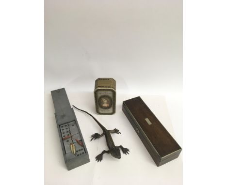 A well detailed gilt metal model of a gecko, a set of metal dominoes, treen box and a Roger and Gallet vanity box