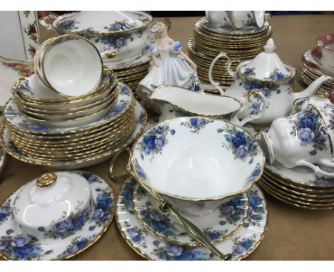 A Royal Albert moonlight rose dinner/ tea service comprising tureen dinner plates meat plate desert bowls cups sauces tea pot