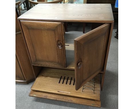 An Ercol television cabinet.Approx 52x85x95cm high