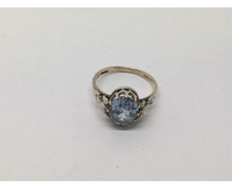 A 9ct gold ring set with an aquamarine type stone, approx size G and approx 2.7g.