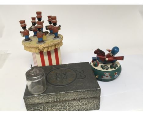 A hammered pewter box and two vintage painted wood toy automata. (3)