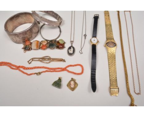 Hinged silver bangle, half engraved, another silver bangle, agate bracelet, coral necklace, wristwatches etc.