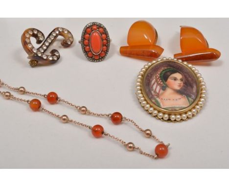 Yellow metal cornelian bead chain, coral and marcasite ring, a pair of amber type ear-rings, a paste set letter P brooch and 