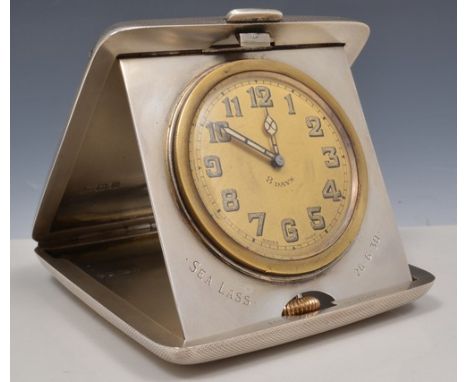 Silver travelling clock, marked Sorley, Glasgow, Birmingham 1929, engine turned casing, dial fascia, engraved Sea Lass 26.6.3