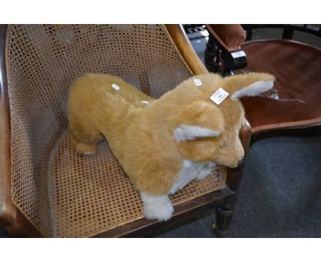 Soft toy fireside model of a Corgi, length 55cm.