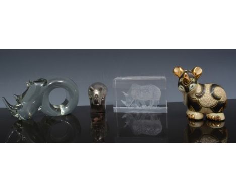 Lead crystal novelty napkin ring, designed as a Rhinoceros, plated model of a Rhinoceros and two other items (4).