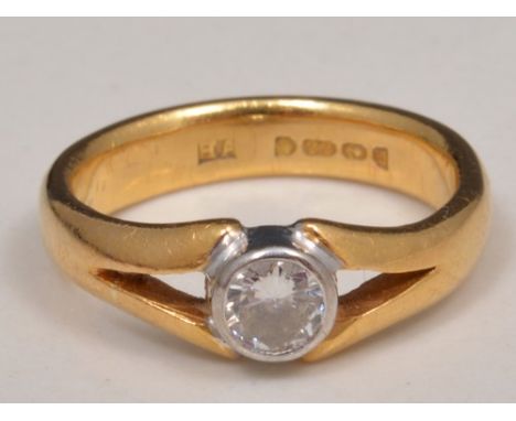 22ct gold diamond solitaire ring, with a brilliant cut stone.