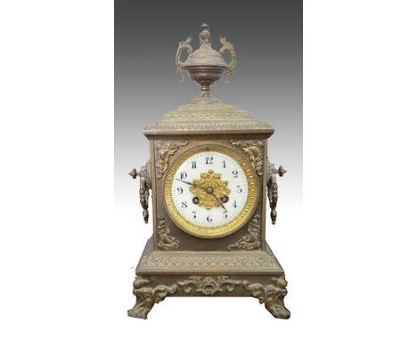 French brass case mantel clock, with an urn finial, ivorine dial, cylinder movement, striking on a bell, 41cm.