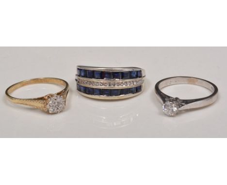 9ct diamond cluster ring, white metal diamond solitaire ring and a 9ct sapphire and diamond half eternity ring (3).