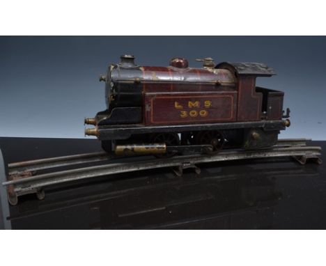 O gauge model railways, Bowman LMS300 tank engine, original box, another, other O gauge rolling stock and track.