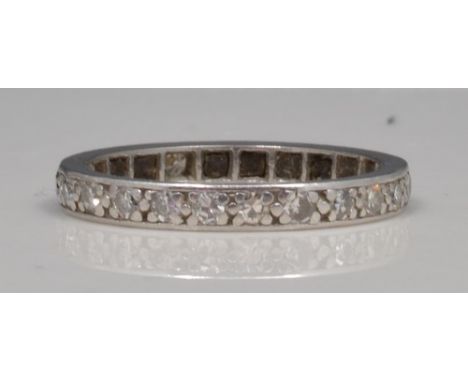 White metal diamond set eternity ring.