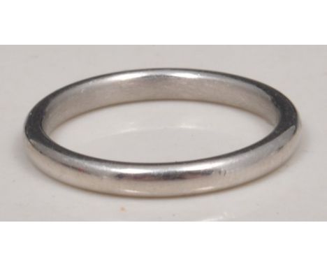 Platinum wedding band, size K.