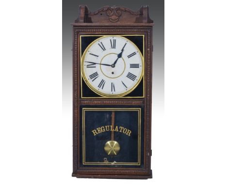 Oak cased "REGULATOR" wall clock, by Waterbury Clock Co., USA, enamel dial, 88cm overall.