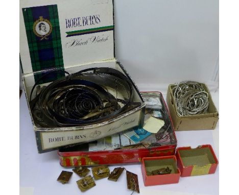 A quantity of clock escapements, clock fusee chains and assorted springs