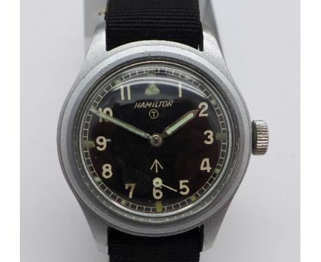 A Hamilton manual wind military wristwatch, broad arrow dial, case back marked W.W.W. A5910  3518826, 36mm diameter, working 