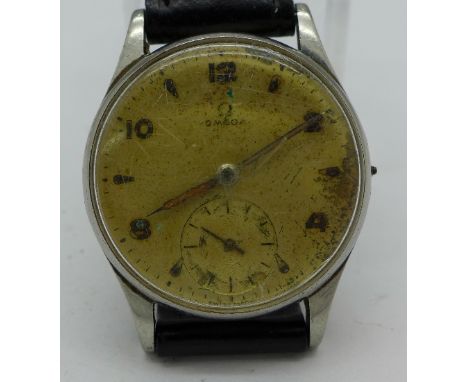 An Omega manual wind wristwatch, 265 calibre, 15 jewels, lacking crown, ticking. Case diameter 33mm