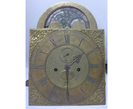 A longcase clock movement and dial, the brass dial with arched top and phases of the moon within the arch (moon-roller), Dan 