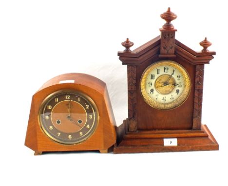 A carved mahogany and a walnut mantel clock