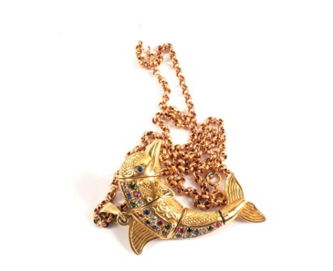 A 9ct gold stone set dolphin pendant on chain