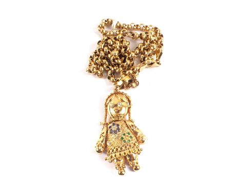 A large 9ct gold 'doll' pendant set with coloured stones on 9ct gold belcher chain