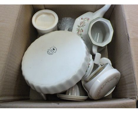 A fifty six piece dinner and tea service 'Eternal Beau' by Johnson Bros, lists included (two boxes) 