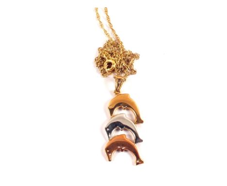 A 9ct gold three coloured gold dolphin pendant on chain