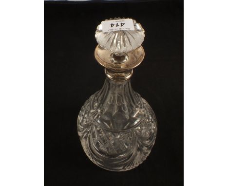 A cut glass silver mounted decanter