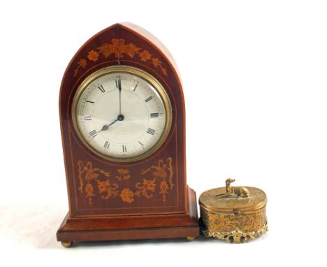 An Edwardian mahogany marquetry inlaid mantel clock and a hinged brass trinket box with floral engraving and dog upon lid (no