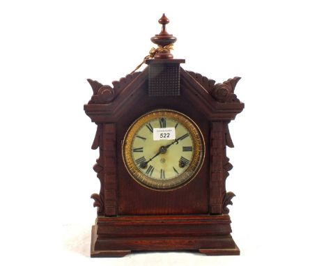 An oak cased Ansonia mantel clock