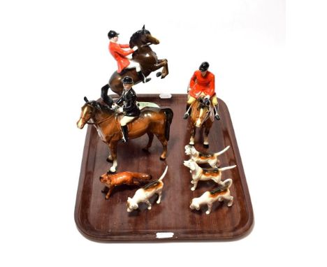 Beswick Hunting Group Comprising: Huntsman, (Style Two, Standing), model No. 1501, Huntsman (On Rearing Horse), Second Versio