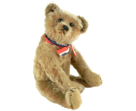 German mohair Teddy Bear, circa 1909, straw filled light brown mohair bear with black boot button eyes, stitched nose, mouth 