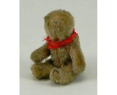 Miniature WW1 Mascot pocket Teddy bear, the little light brown mohair bear with remains of ears, swivel head and jointed at s