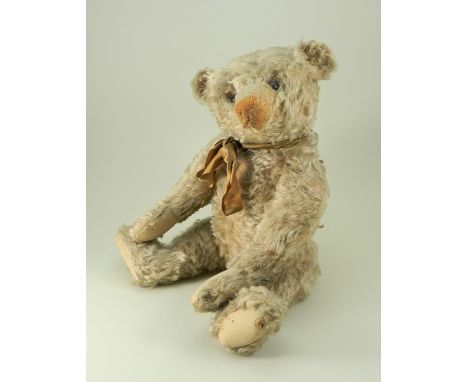 Rare white mohair Steiff Teddy bear, circa 1909, the straw filled bear with black boot button eyes, pointed clipped muzzle wi
