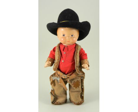 ‘Puggy Cowboy’ Petite doll, American circa 1930, the composition character doll with painted blue eyes, moulded red hair and 