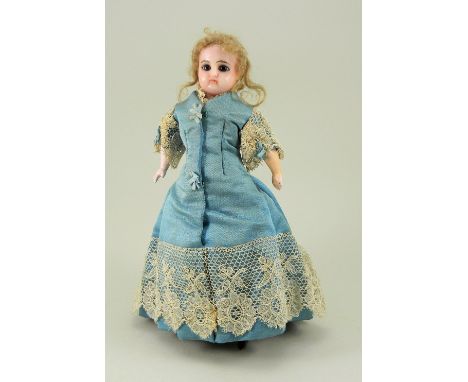 Wax over composition shoulder head lady doll, German circa 1860, with fixed blue glass eyes, painted mouth and shoulder lengt