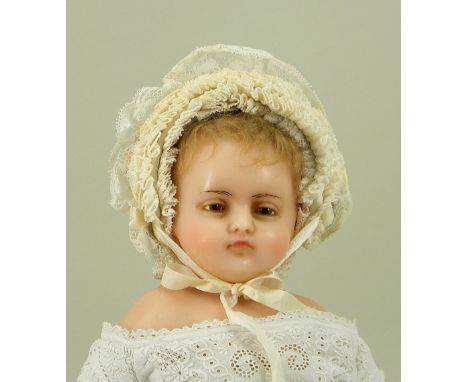 ‘Molly’ a poured wax shoulder head doll by Pierotti, English circa 1870, the beautifully moulded face with unusual hazel colo