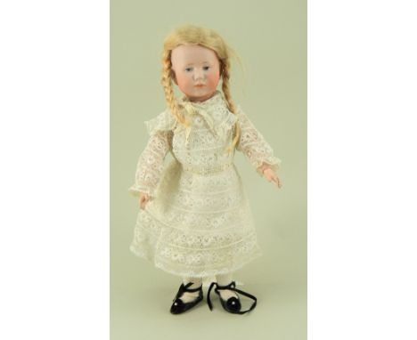 Kammer &amp; Reinhardt 101 bisque head character doll, German circa 1910, with painted light blue eyes, single stroke eyebrow