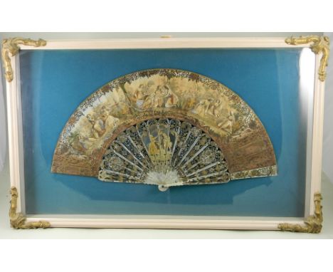 A beautiful mother of pearl and painted card fan, the fan decorated with various scenes of damsels at leisure, with gold embo