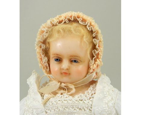 ‘Joy’ a poured wax shoulder head doll by Pierotti, English circa 1870, the well moulded face with inserted light blue glass e