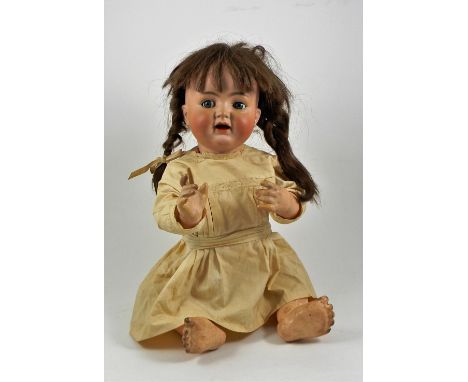 A Simon &amp; Halbig/K&amp;R  126 bisque head baby doll, German circa 1910, with blue glass ‘flirty-eyes’, open mouth and two