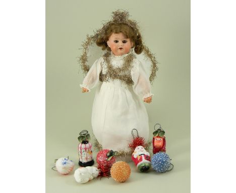 A.M 390 bisque head Fairy doll, German circa 1910, with brown glass eyes, open mouth and upper teeth, brown wig and on a full