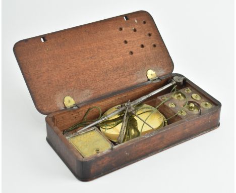 A 19th century Victorian cased set of medicine scales and weights by J. &amp; W. Holt. Scale marked no. 51 Hay Market St Jame