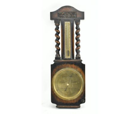 A late 19th century Victorian mahogany cased wall barometer by Short and Mason. The barometer with carved floral frieze and b